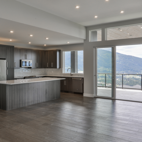 custom home kitchen island and walkout patio