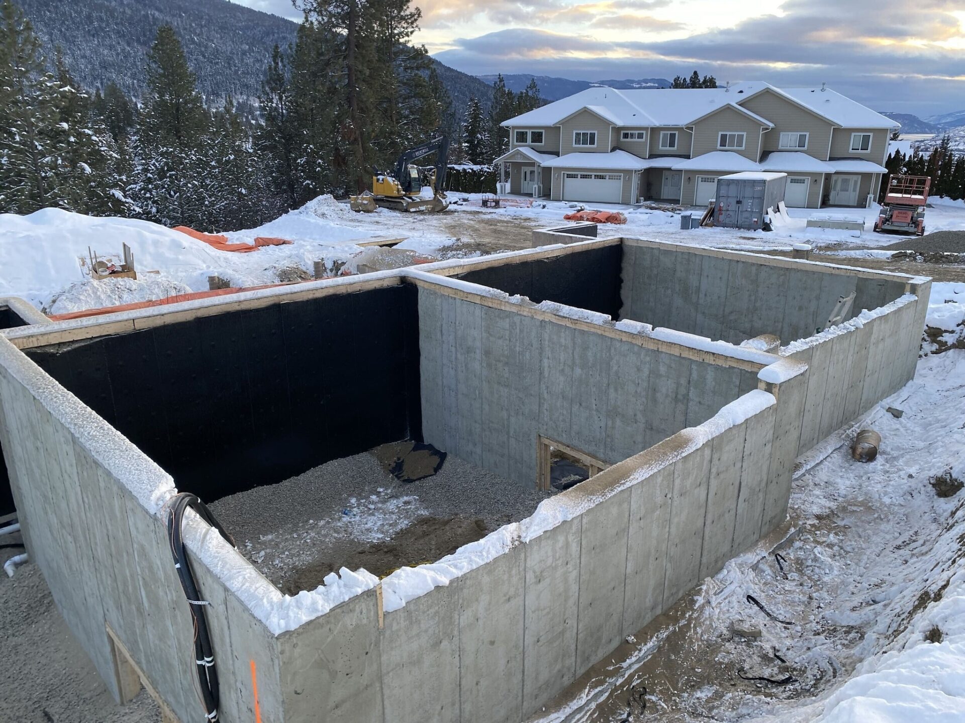 concrete foundations at multifamily construction site
