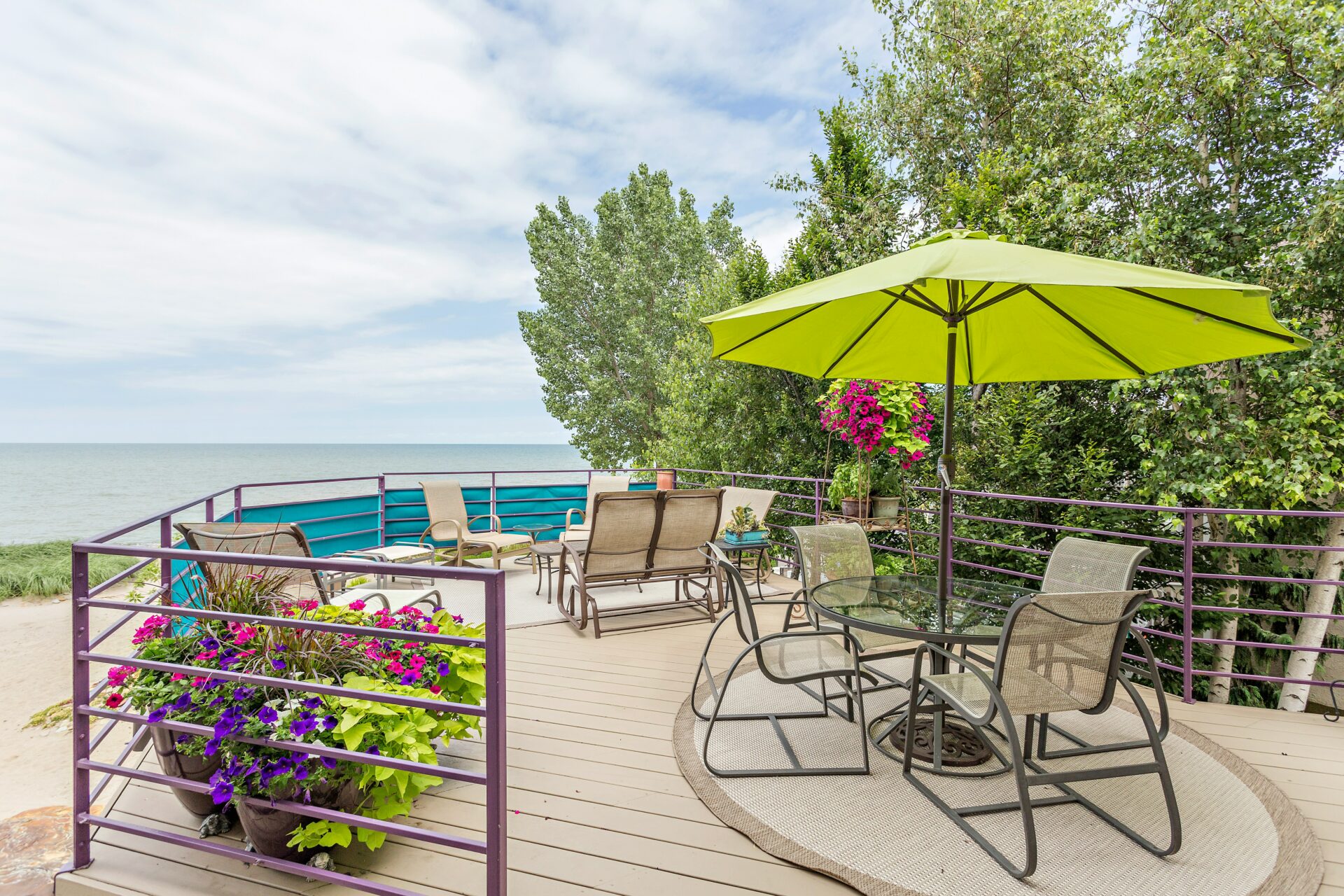 Summer patio with chairs and umbrella